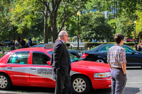 Pedestrians and cab in Dupont Circle, Washington, D.C.