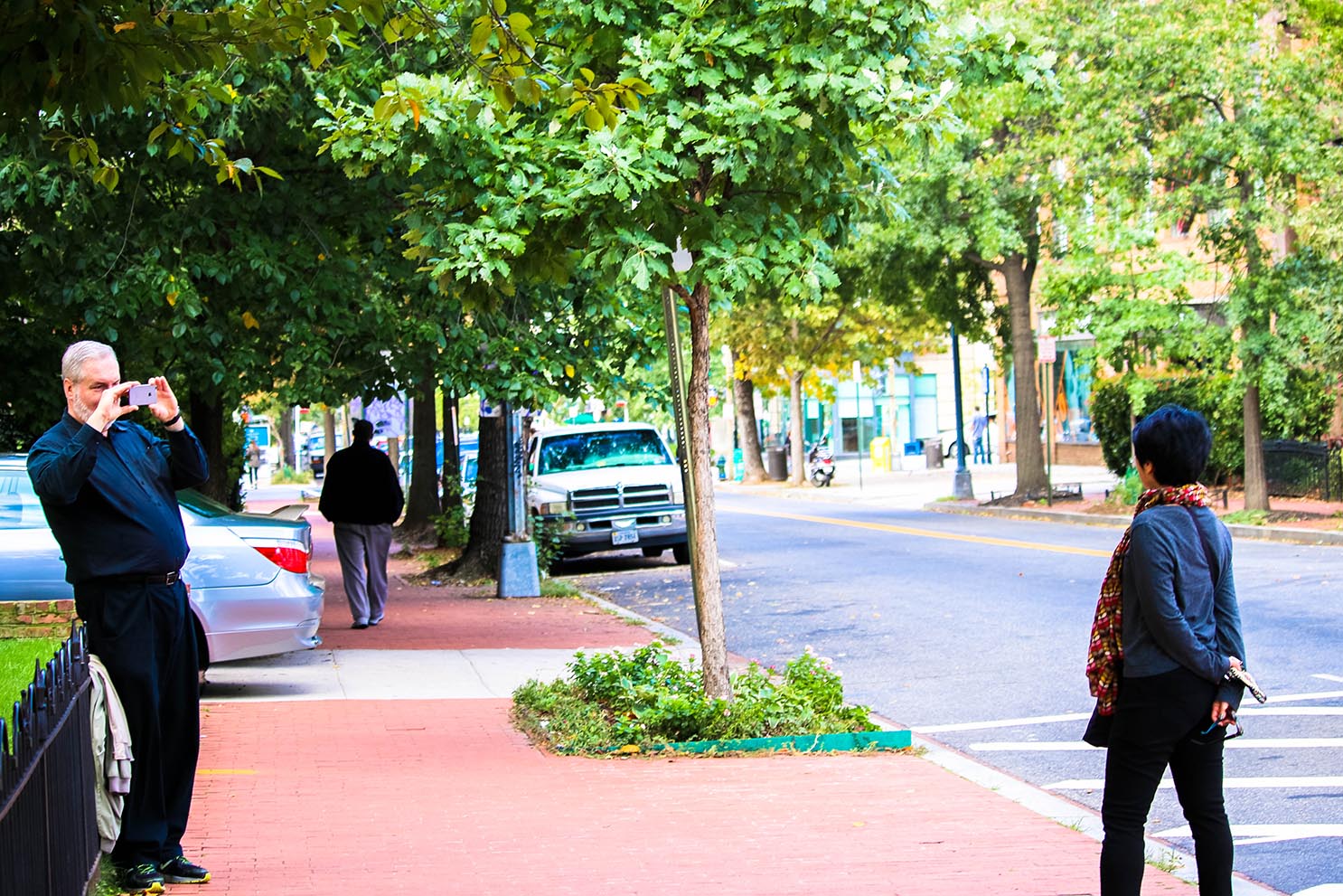 People taking photos in Logan Circle, Washington, D.C.